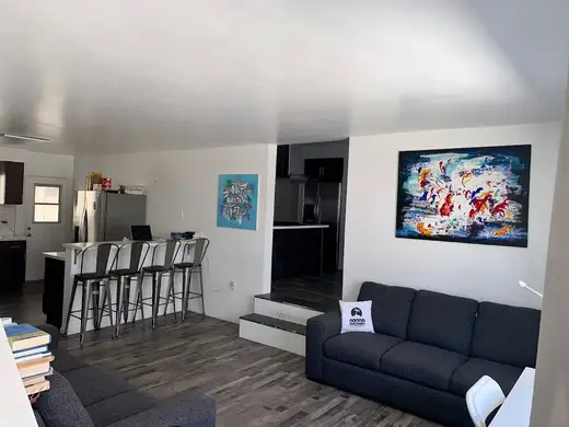 Bright open living area with modern decor at Nonno Recovery California Sober Living home in Los Angeles.